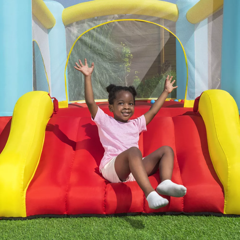 Fisher-Price Bouncemania Inflatable Mega Bouncer with 50 Piece Play Balls, 11 Bounce Stakes, Storage Bag, Blower, and Repair Kit, Multicolor image 5